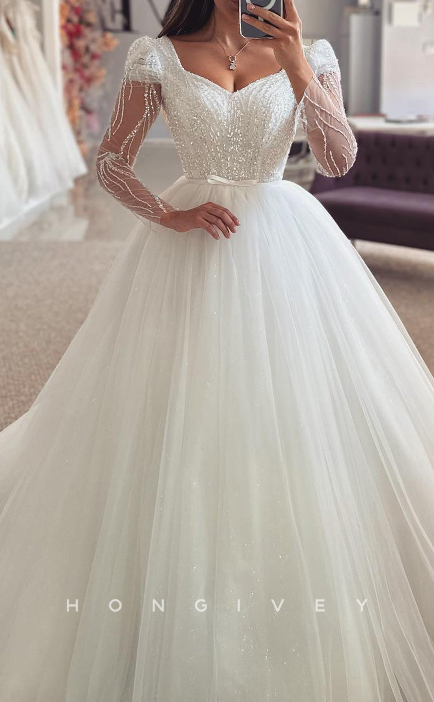 H1692 - Bateau Long Sleeve Sequined Appliques Empire Tulle Wedding Dress