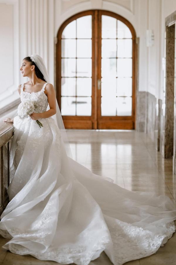 Elegant Long A-line Split Front Sleeveless Wedding Dress with Lace Accents