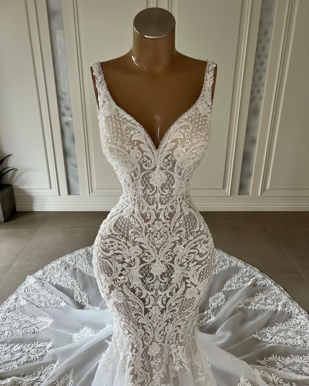 Chic Long Mermaid V-neck Sleeveless Wedding Dress with Lace Embellishments