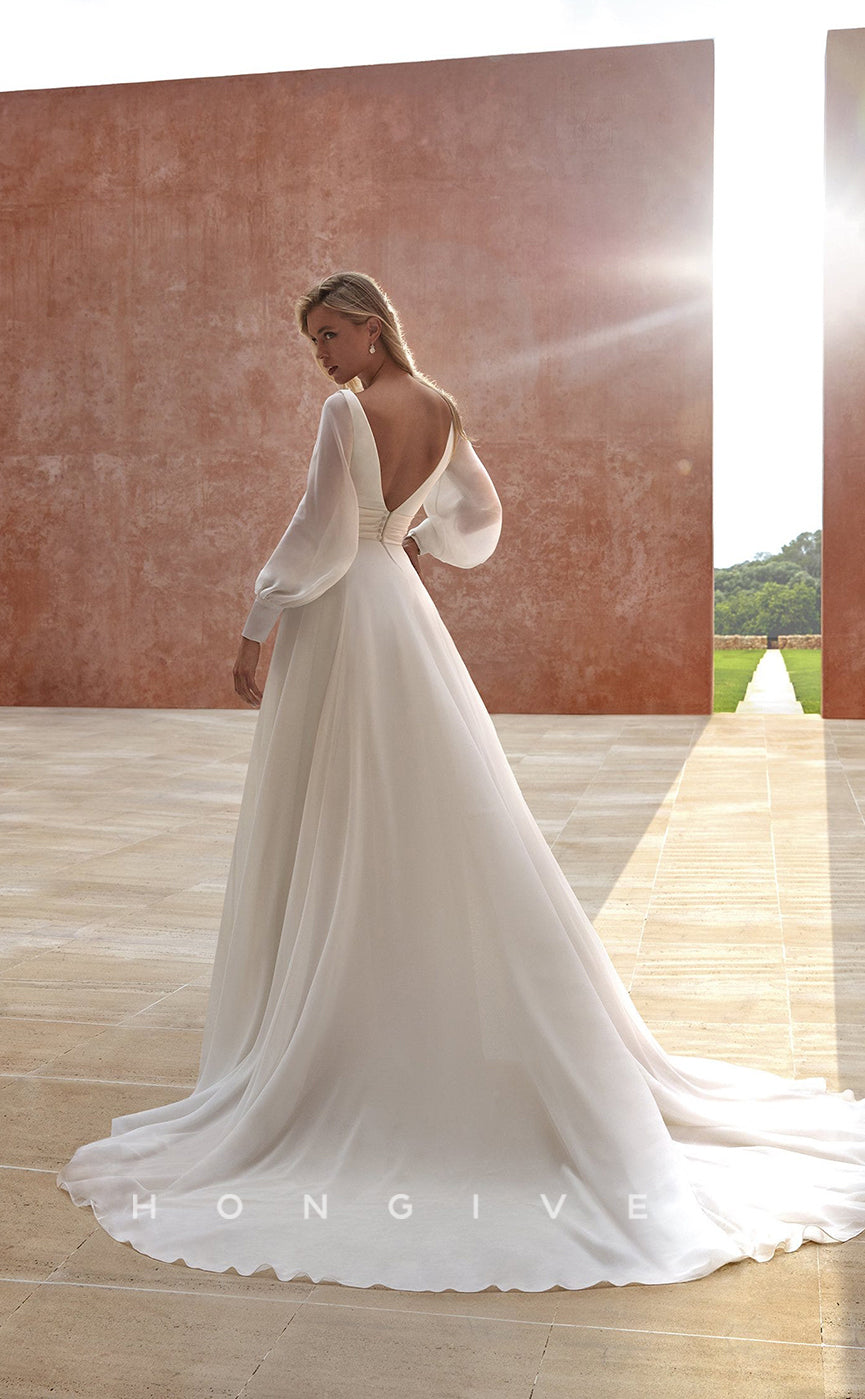 H0871 - Sheer Plunging Illusion Open Back Ruched Long Sleeve With Train Wedding Dress