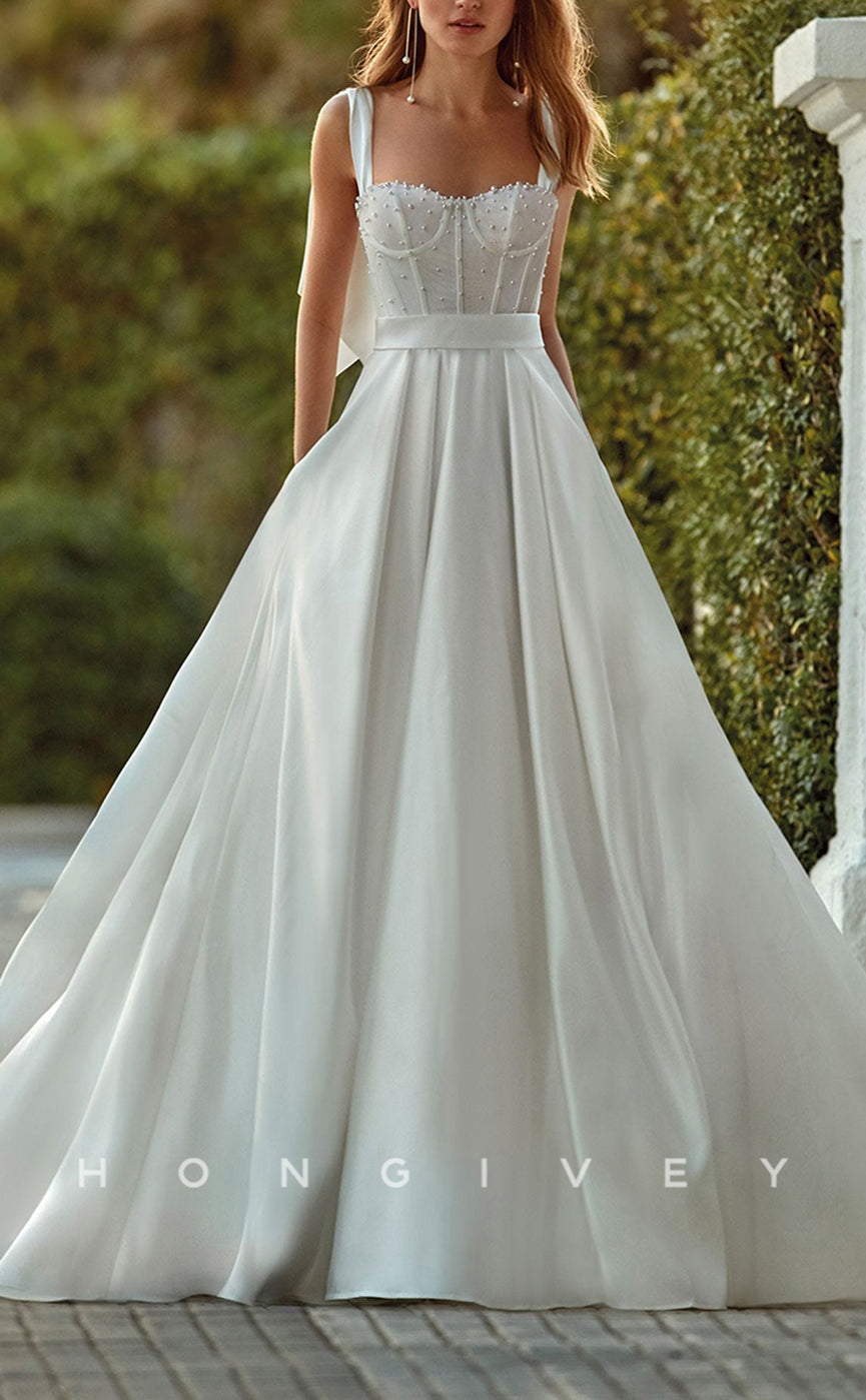 H0911 - Pearl Beaded With Train And Bow Detail Long Wedding Dress