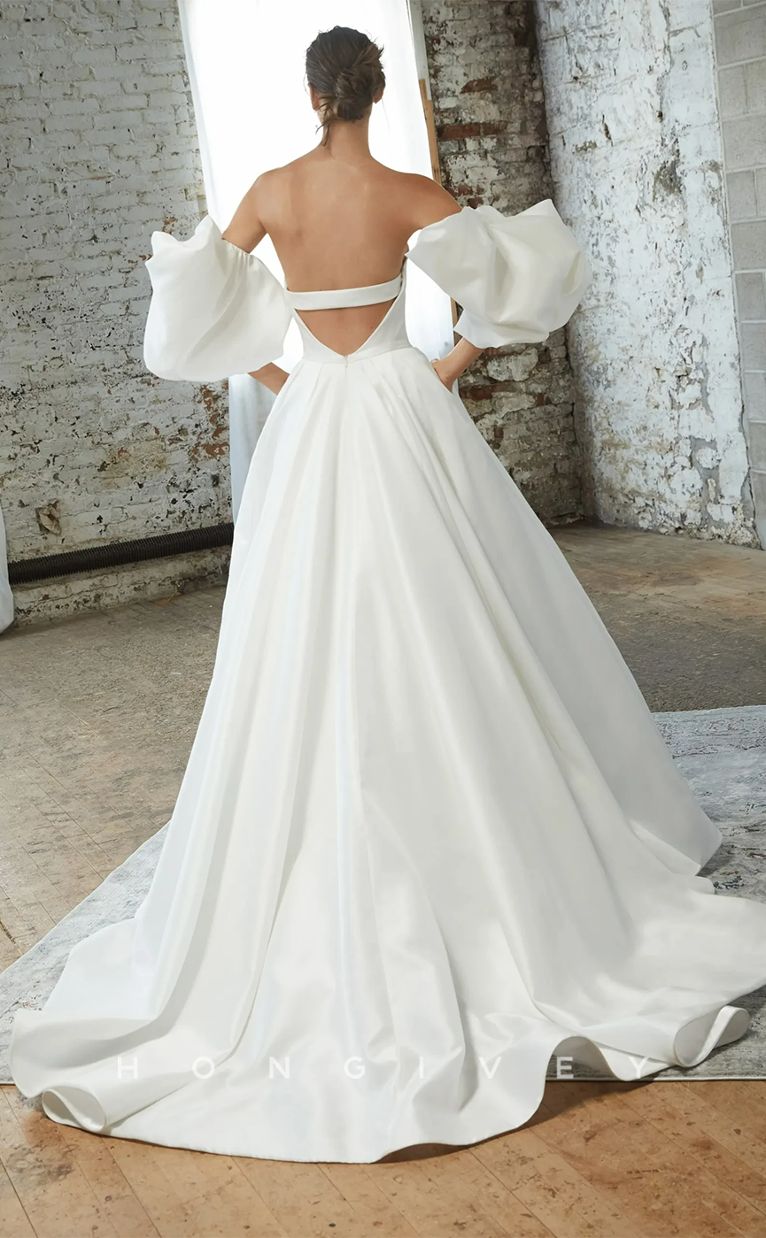 H0942 - Couture Plunging Illusion Puff Sleeves Open Back With Train Long Wedding Dress