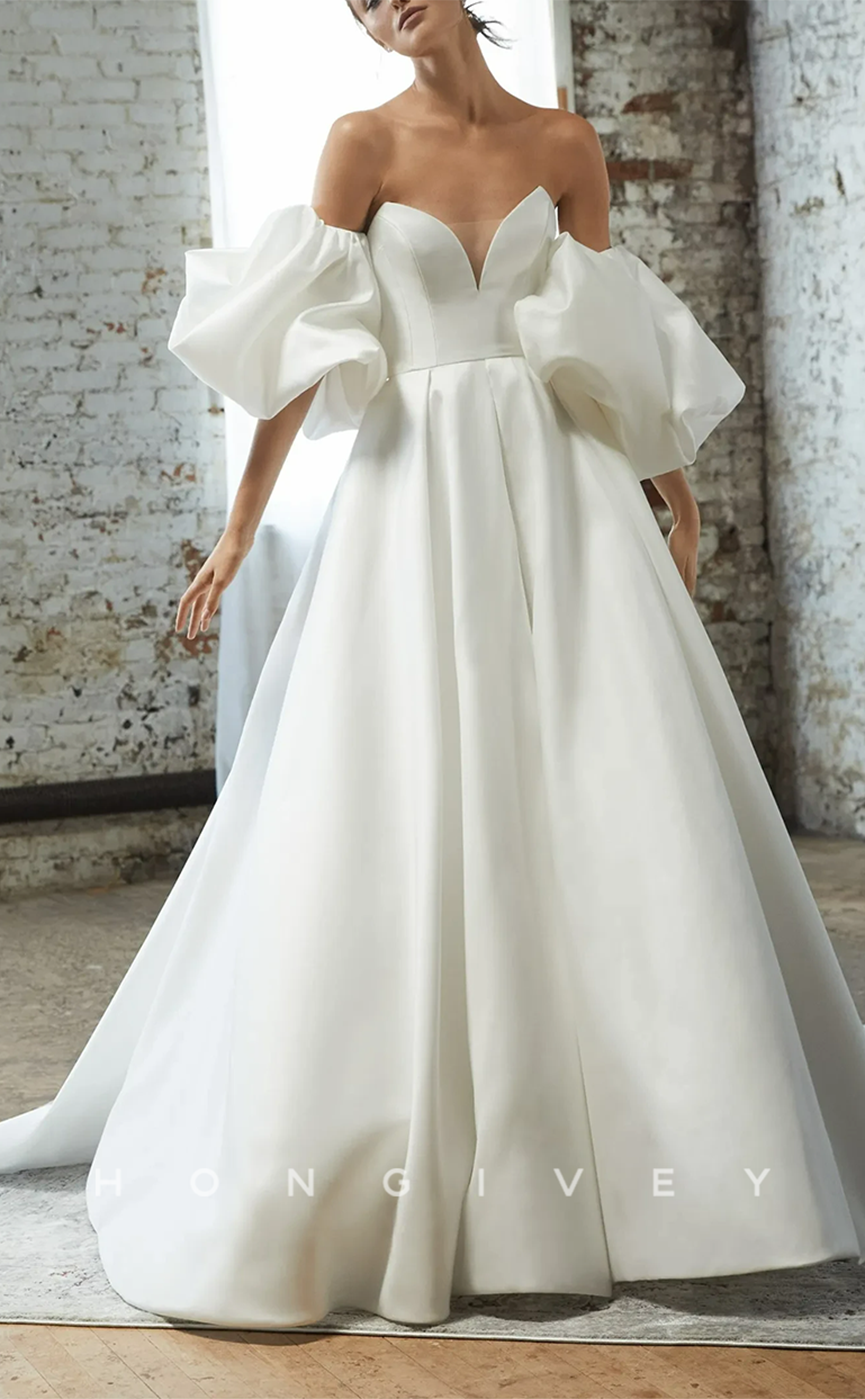 H0942 - Couture Plunging Illusion Puff Sleeves Open Back With Train Long Wedding Dress