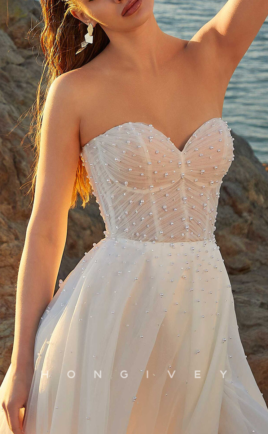 H1025 - Sleeveless Sweetheart Illusion Beaded With Bolero Long Beach Wedding Dress