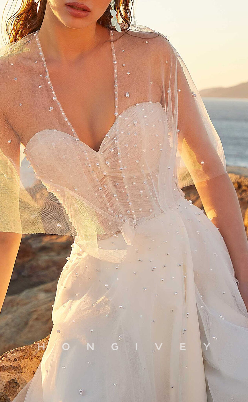 H1025 - Sleeveless Sweetheart Illusion Beaded With Bolero Long Beach Wedding Dress