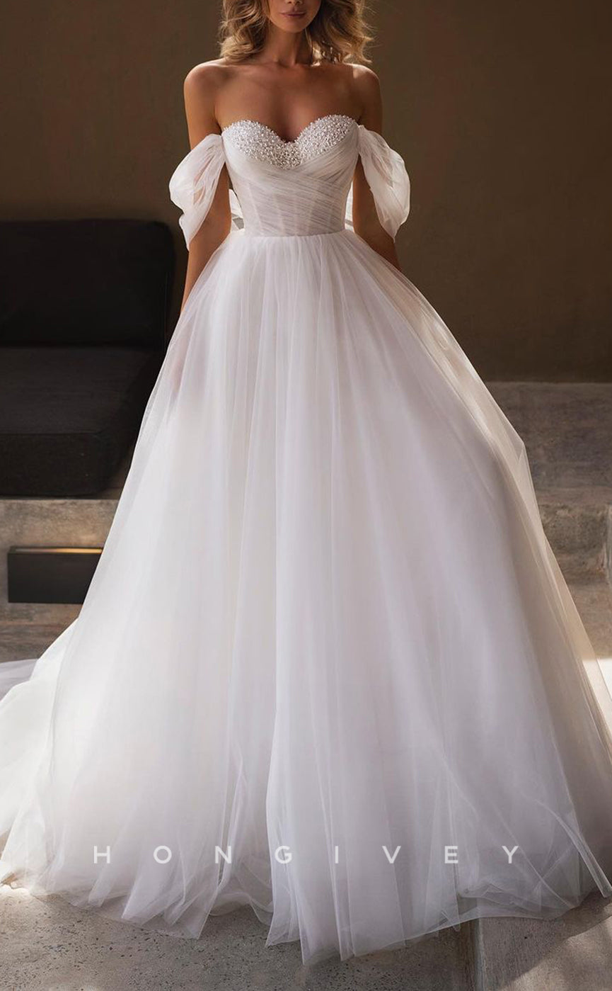 H1215 - Sexy Tulle A-Line Off-Shoulder Empire Illusion Beaded With Train Wedding Dress