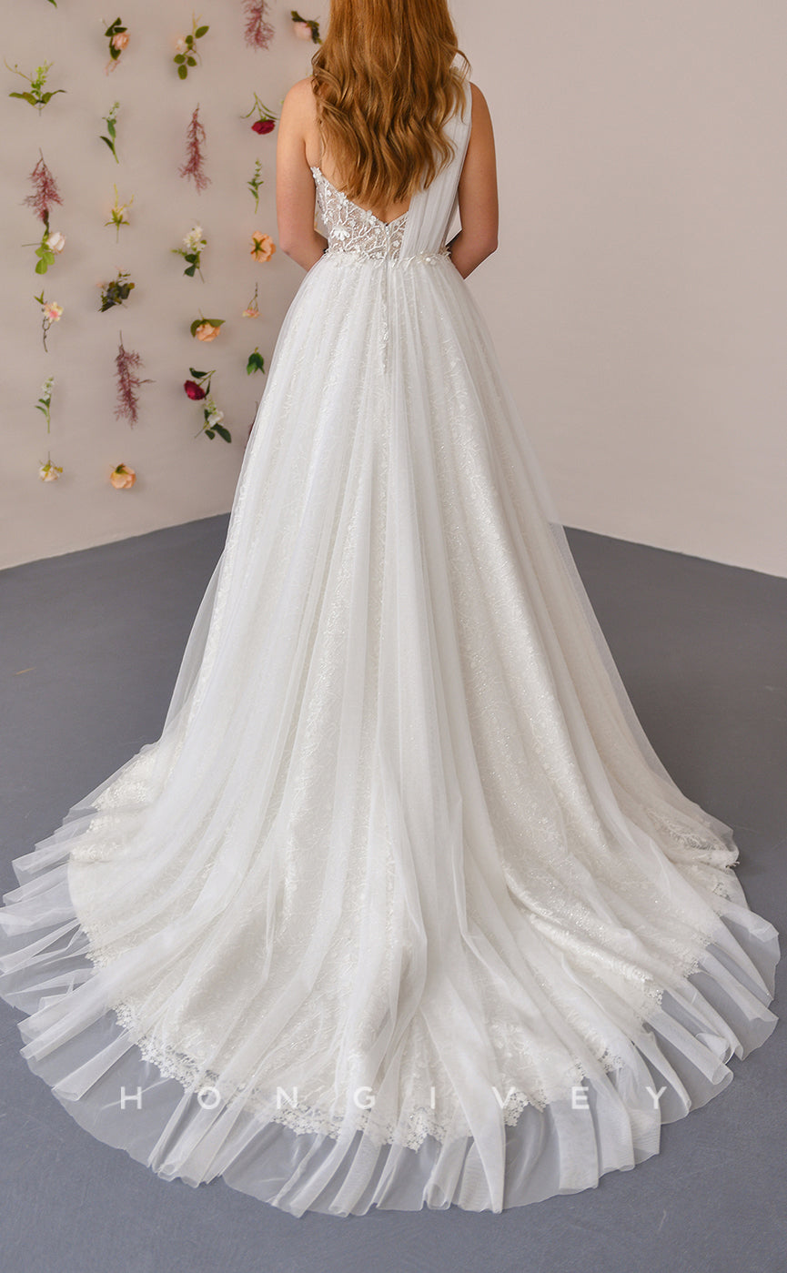 H1308 - Sexy Tulle A-Line Asymmetrical Spaghetti Straps Empire Illusion Appliques With Train Wedding Dress