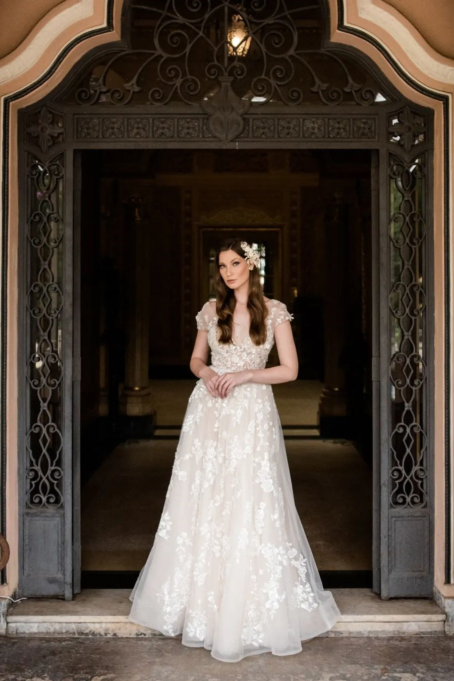 Elegant Long A-line V-neck Wedding Dress with Cap Sleeves and Lace Details