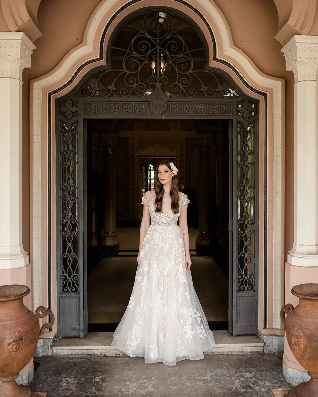 Elegant Long A-line V-neck Wedding Dress with Cap Sleeves and Lace Details