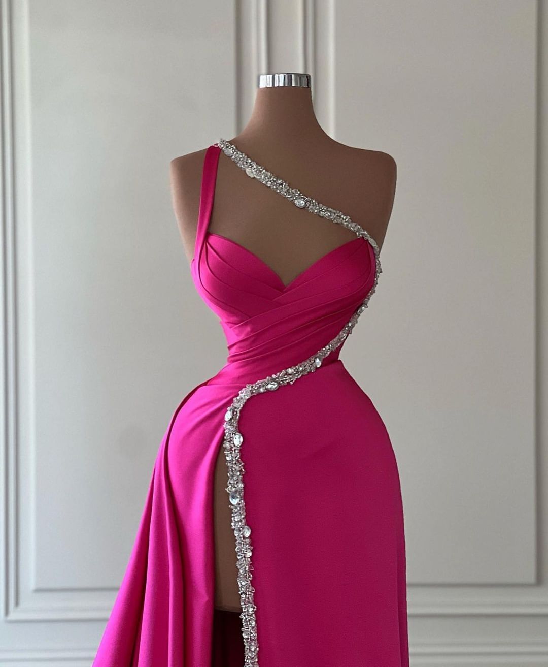 Beautiful Long Fuchsia One-Shoulder Prom Dress with Jewel Embellishments and High Slit