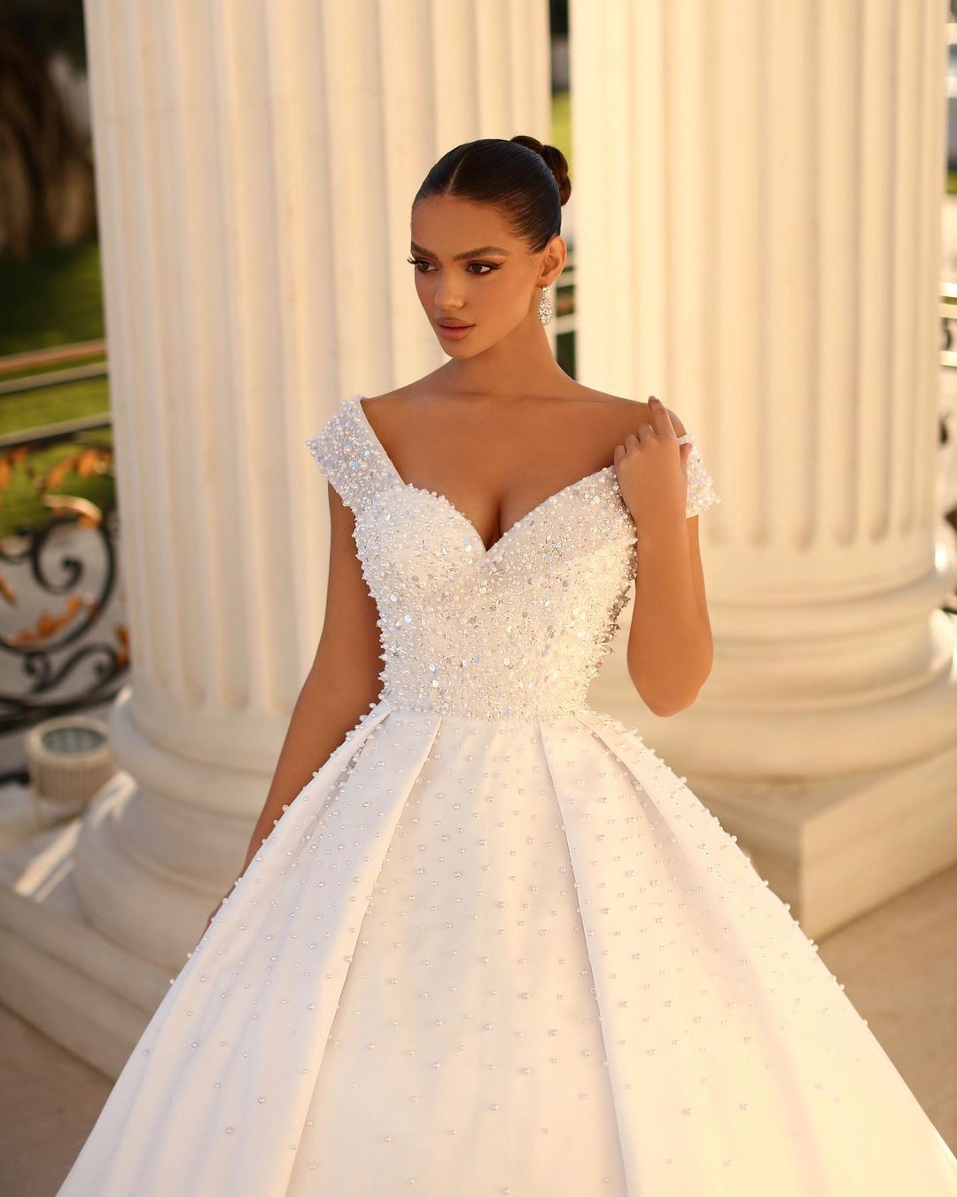 Enchanting Long White Off-the-shoulder A-line Sequined Bridal Dress with Pearl Details