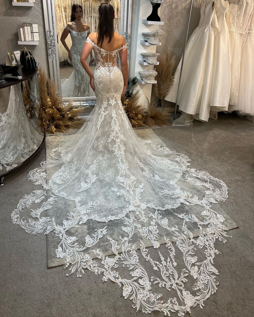 Chic Off-the-Shoulder Sleeveless Mermaid Lace Wedding Dress with Cathedral Train