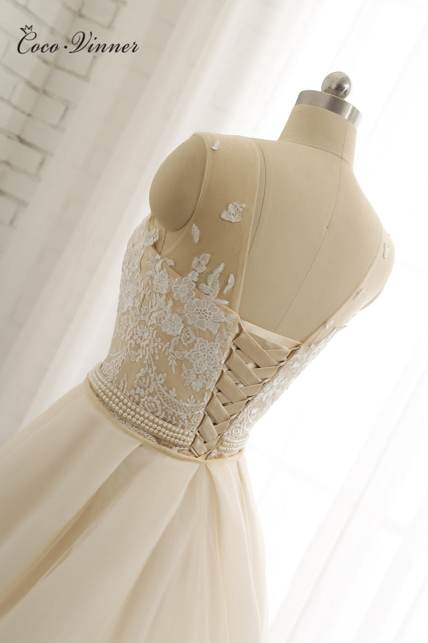 Glamorous Jewel Tulle Champagne Wedding Dress Appliques Sleeveless Overskirt Bridal Gowns with Beading Sash