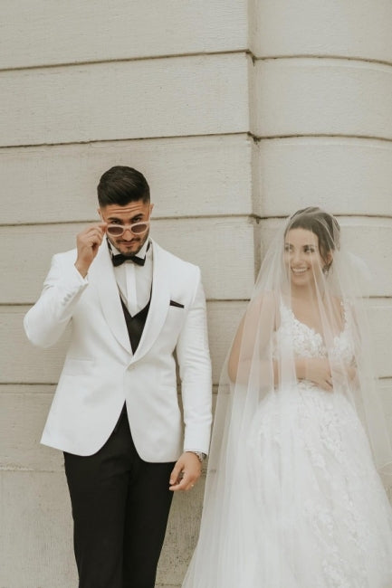 Ivory Sleeveless Straps A-Line Wedding Dress with Flowing Chapel Train